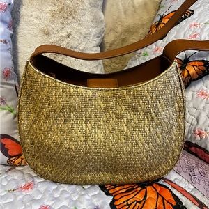 Fossil shoulder bag. 75082. Straw and leather outside, cloth inside.